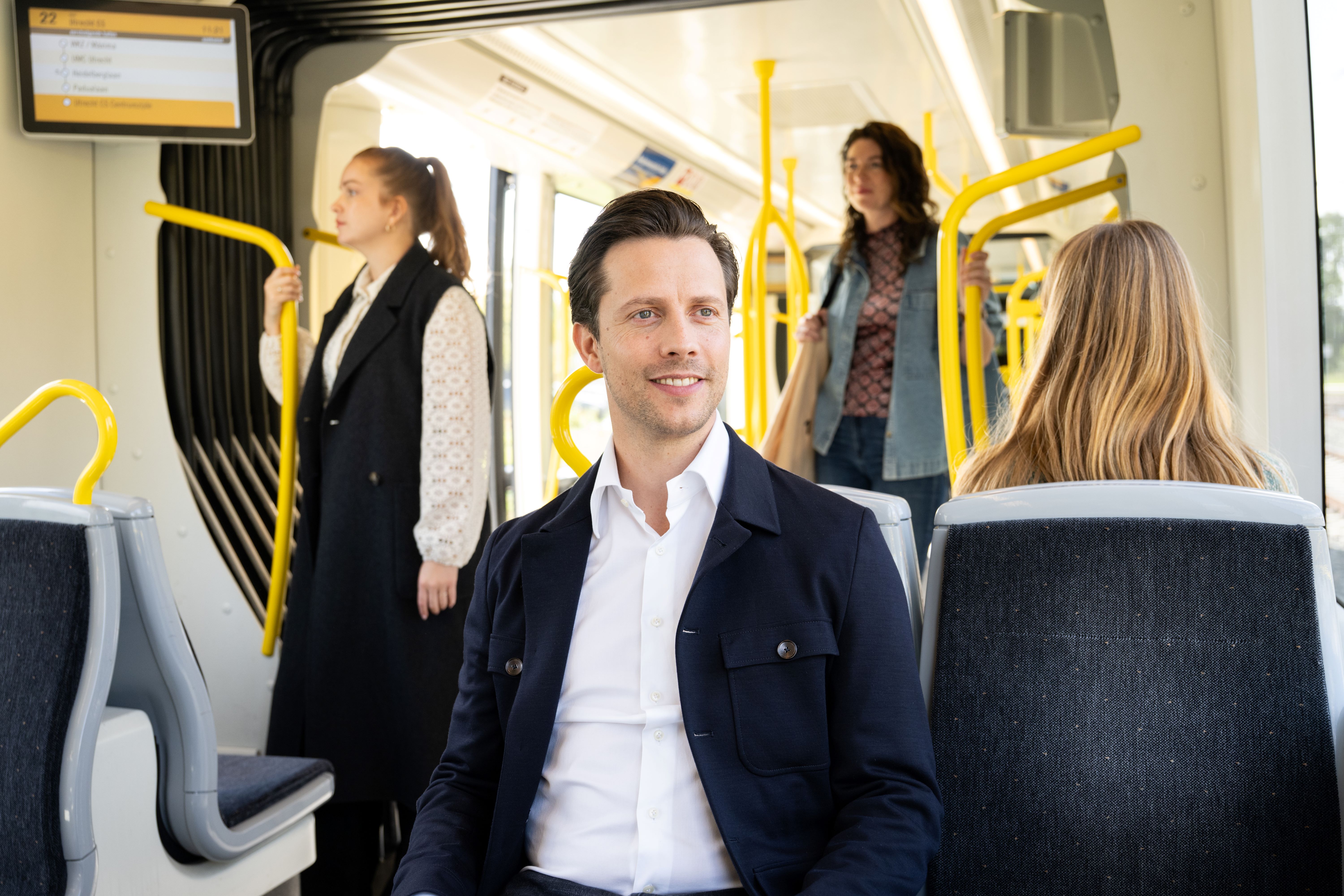 Illustrative public transport scene; vehicles shown are operated by third parties