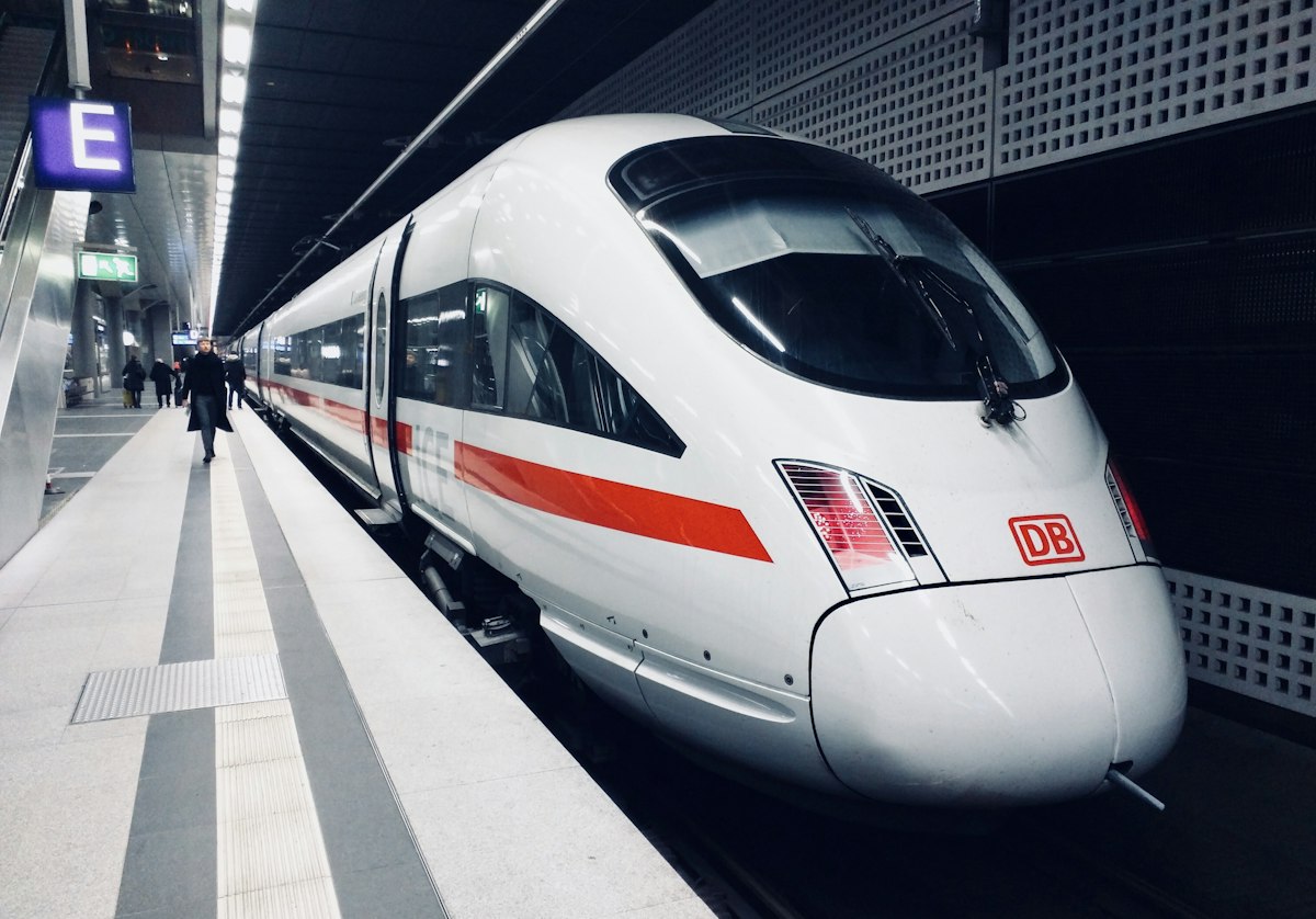 Passenger train arriving at station platform